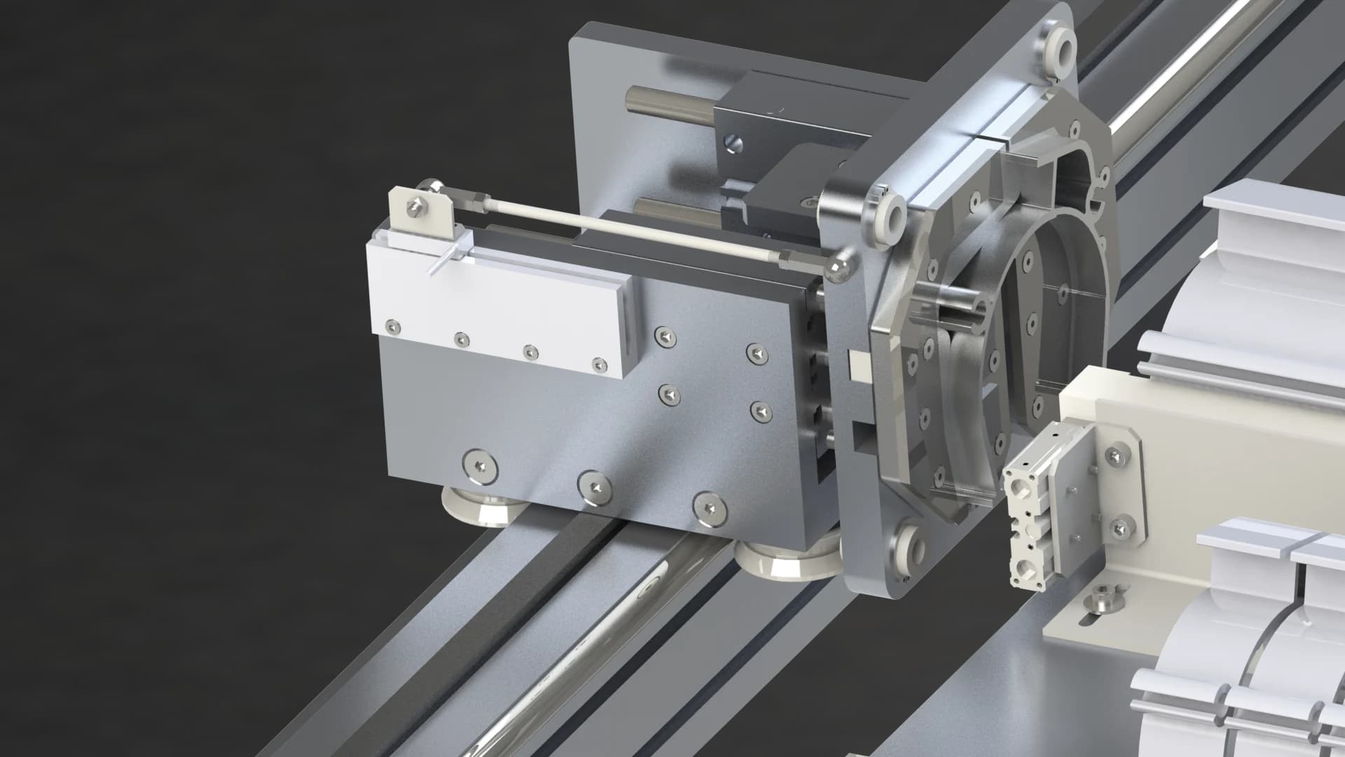 Detail of the carrier head that clamps a profile and moves it along the line.